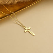 14k Gold necklace with a name engraved cross heart cut-out pendant on a gold background