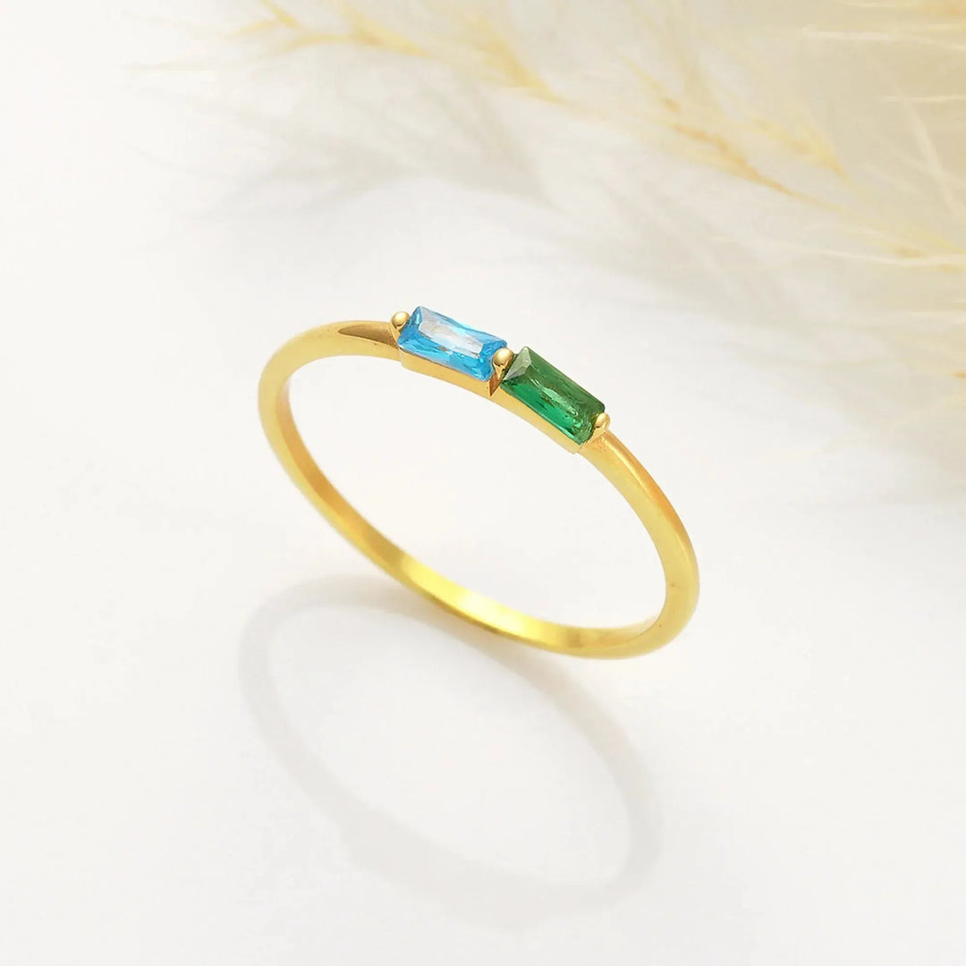 Baguette Birthstone Ring (14 Gold-filled ring) with blue and green gemstones on a white background