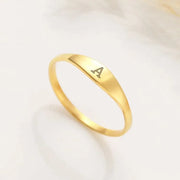14k Gold filled ring with a single letter 'A' engraving on a light background