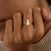 14k Gold filled ring with a cat design on a person's finger