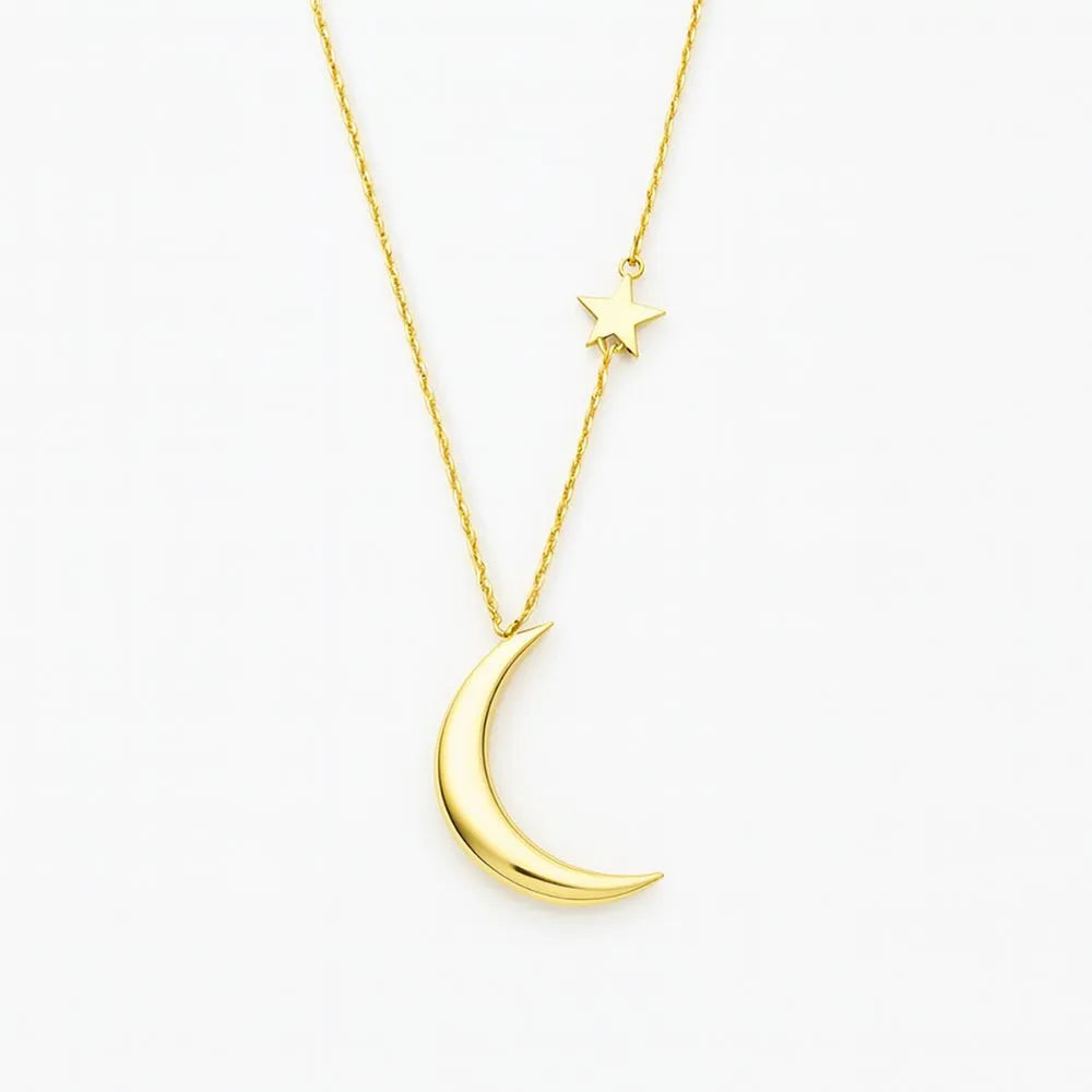 14k Gold necklace with a crescent moon and star pendant on a white background