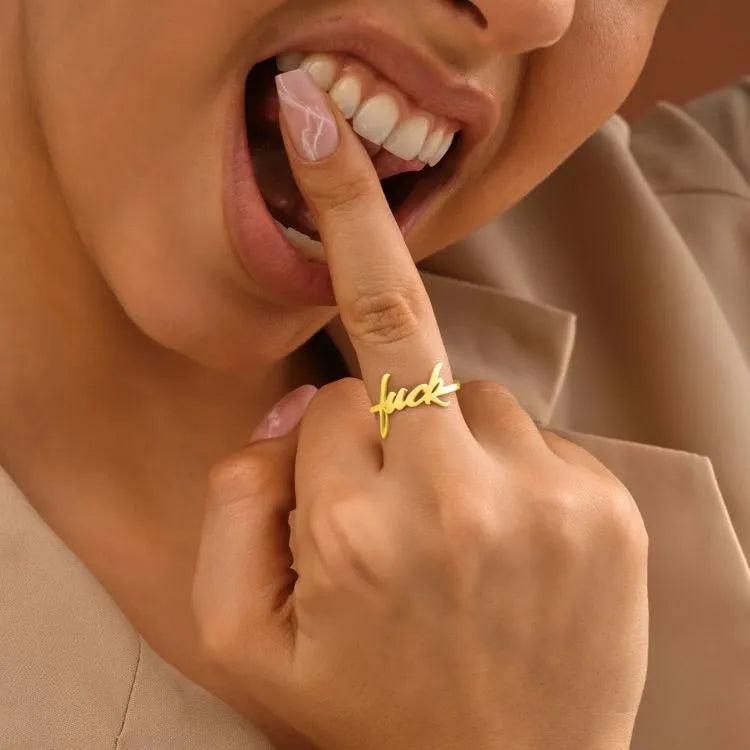 Woman model is wearing a minimalist 14k gold filled ring.