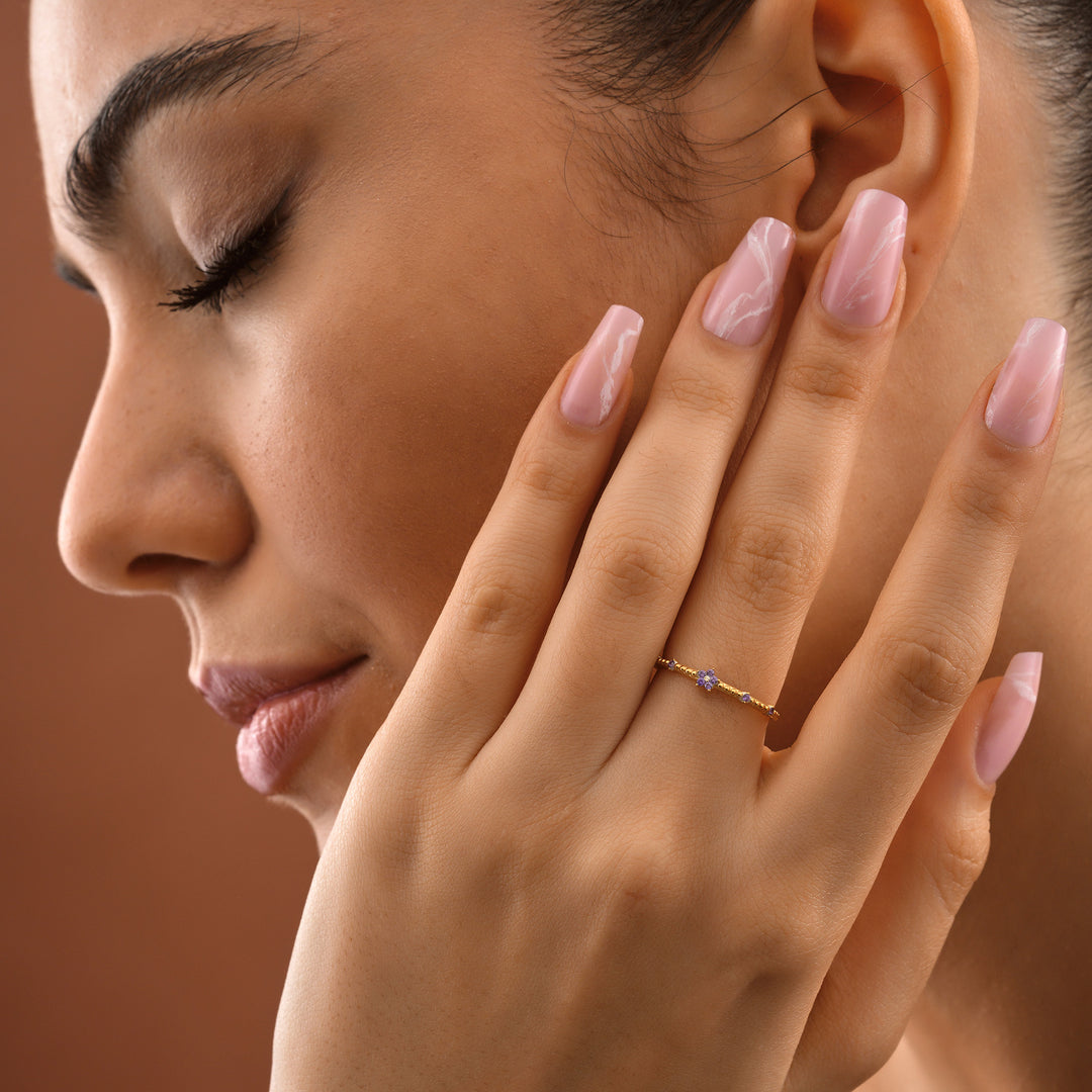 Tiny Flower Birthstone Band Ring - worn by a model