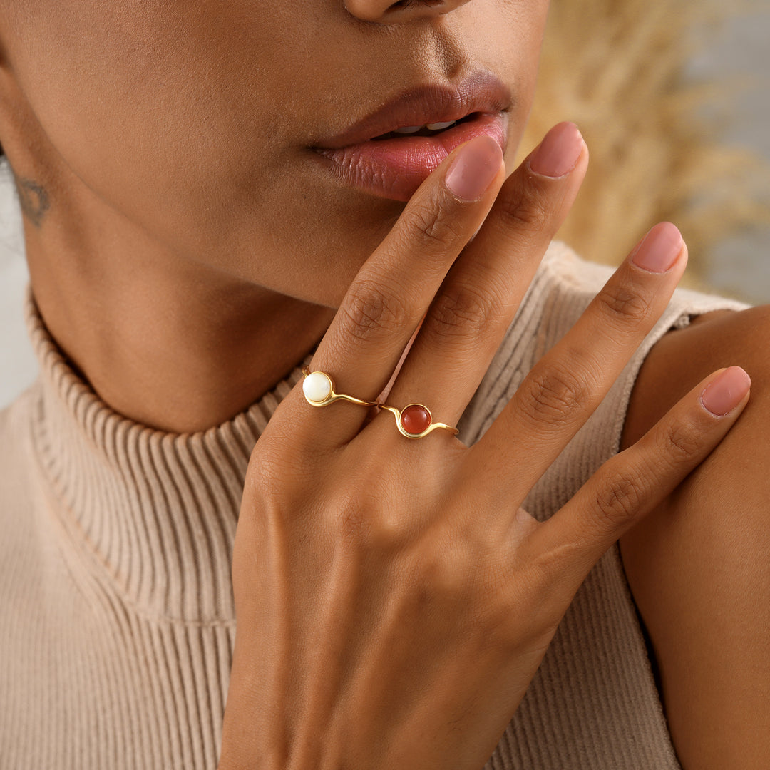 Lyphiyes Moonstone and Carnelian Rings on Model’s Hand – Gold Filled Gemstone Jewelry