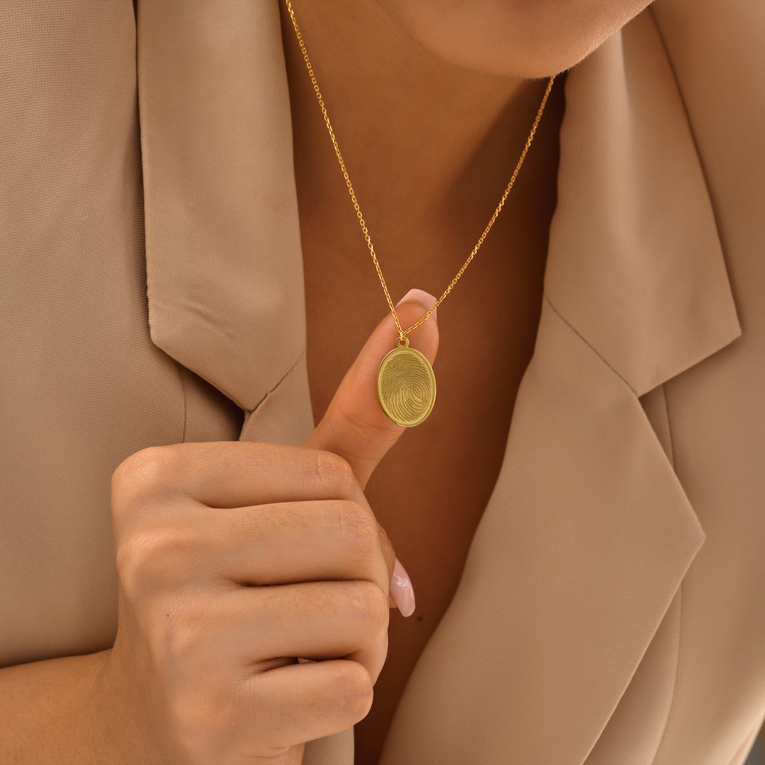 Oval Disc Necklace (Finger Print) - worn by a model 2 