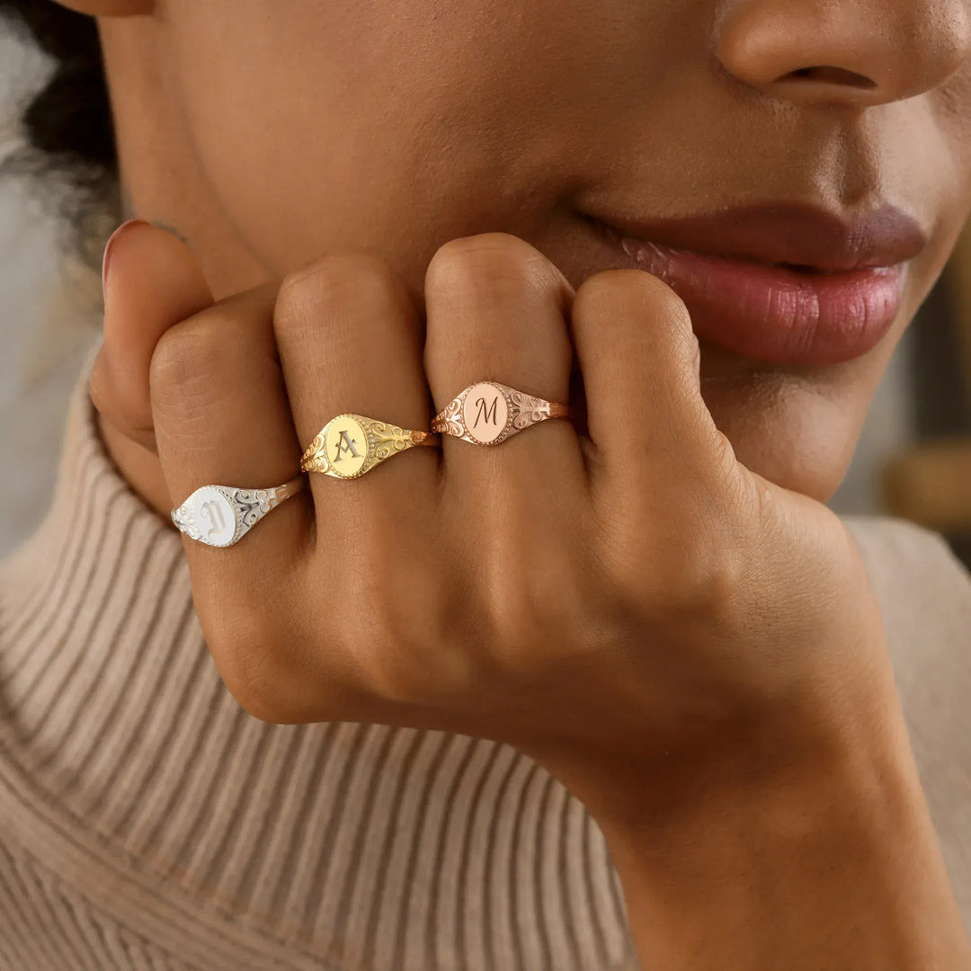 Personalized monogram signet rings in 14k gold filled, 14k rose gold filled, and 925 sterling silver, worn on hand
