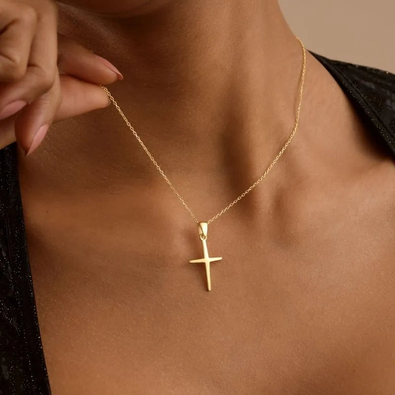Woman model wearing a cross necklace