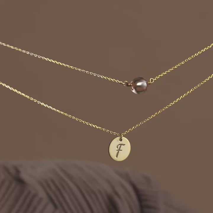 Close-up of Layered Disc Initial Necklace with Birthstone – Engraved Letter Pendant in 14k Gold Filled Finish