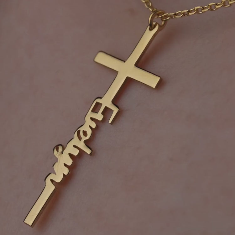 Product video of the cross name necklace