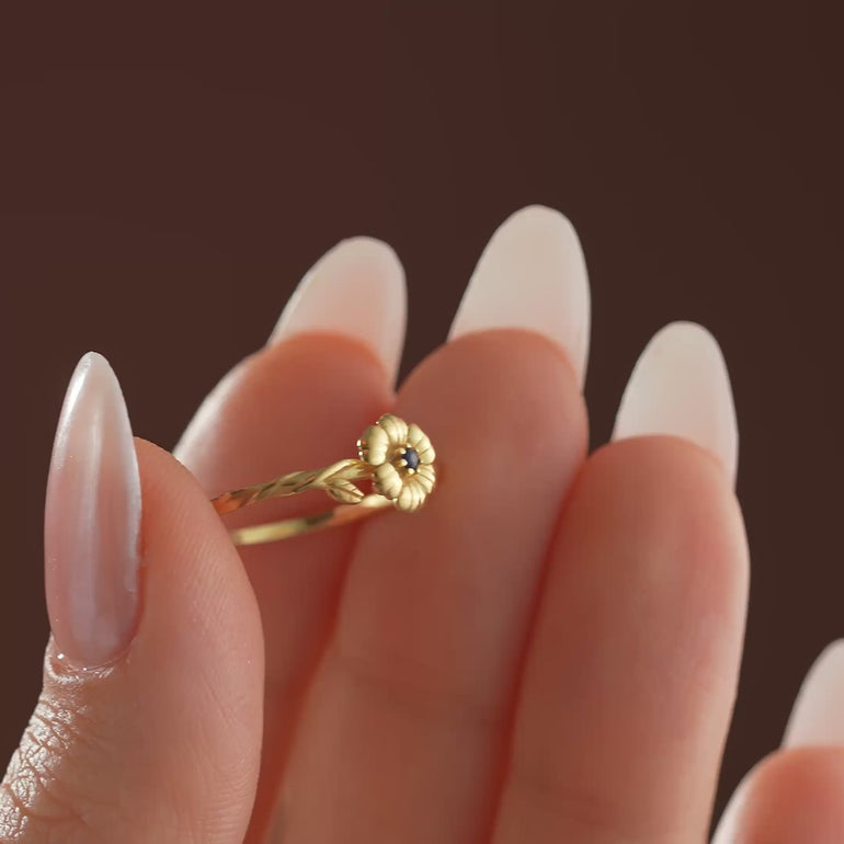 Product video of cut out birth flower ring